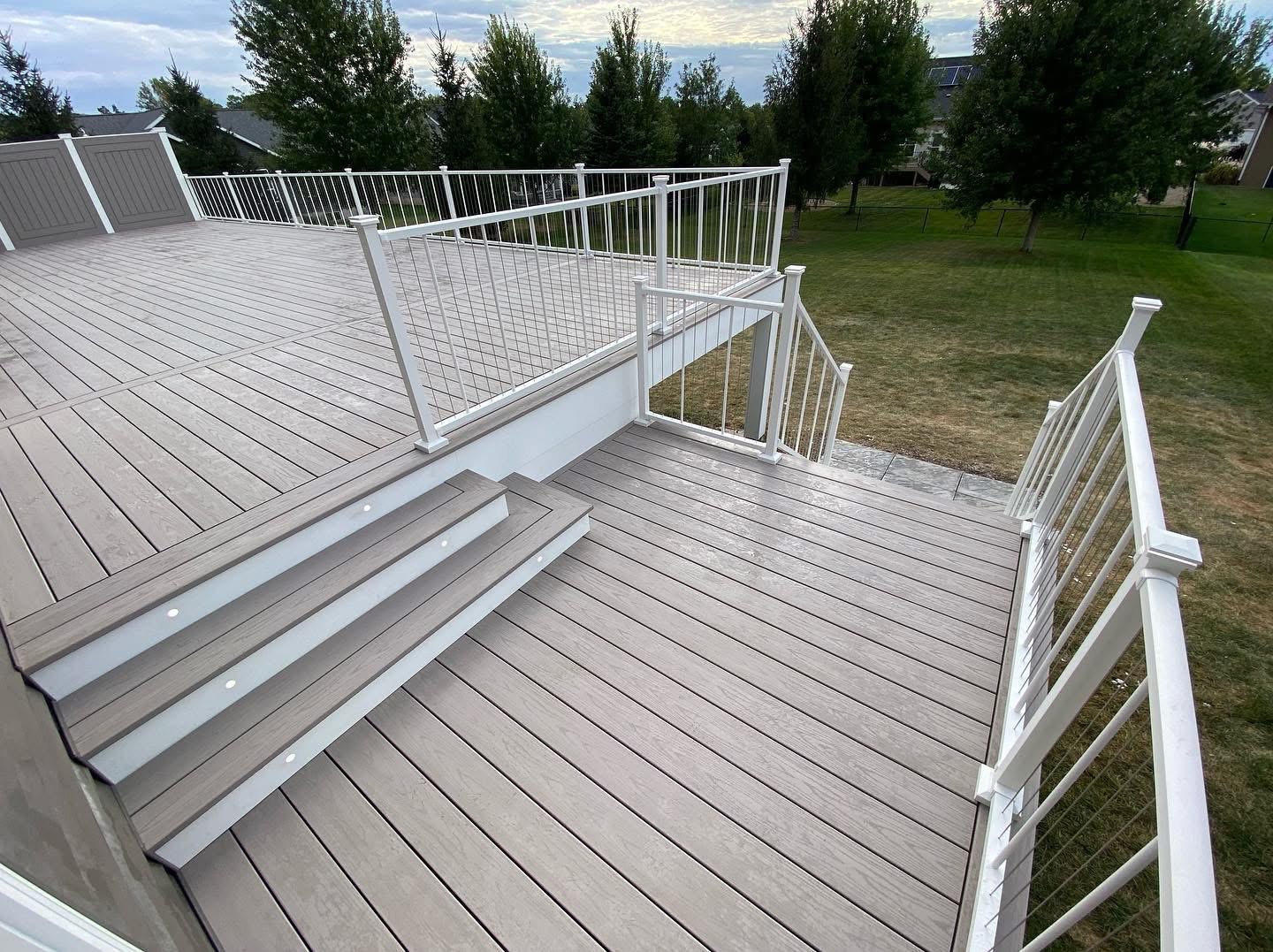 Composite deck with lighted steps